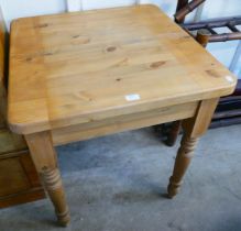 A small pine kitchen table