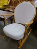 An Ercol Blonde elm and beech 315 model rocking chair