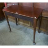 A George II mahogany pad foot side table