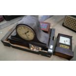 A wooden mantel clock, one other clock, a cutlery box containing assorted items and a jewellery box