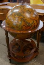 An Italian terrestrial globe cocktail cabinet/trolley