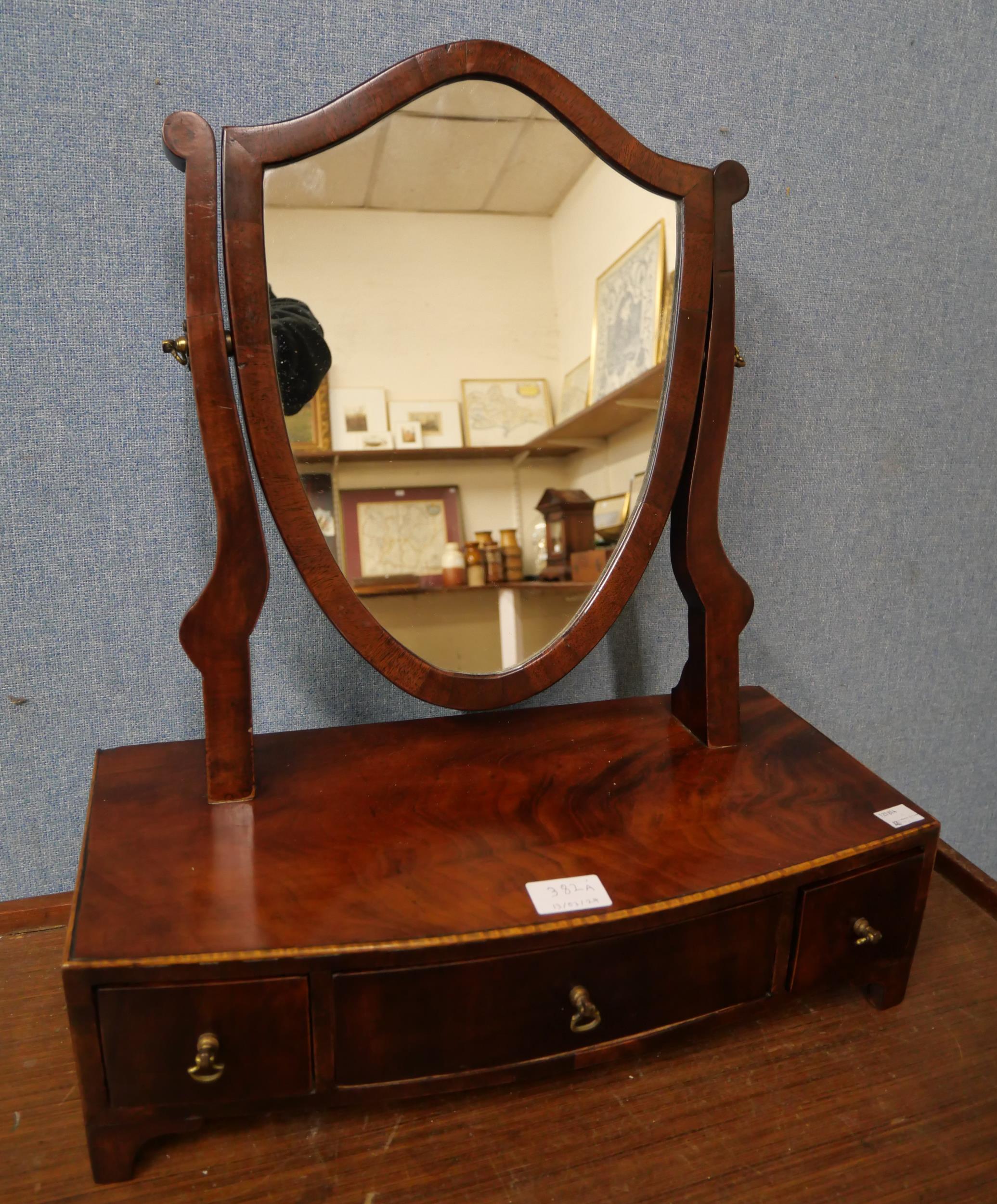 A Victorian mahogany toilet mirror