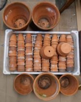 Assorted terracotta garden plant pots