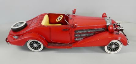 A tin-plate model roadster