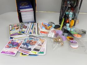 A box of One Piece gaming cards and a box of Pokemon gaming accessories