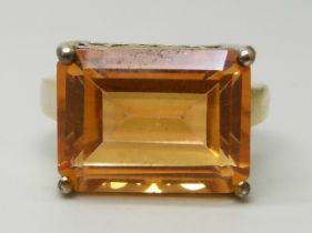 A silver gilt, padparadscha emerald cut quartz ring, N