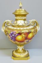 A Royal Worcester hand painted angel head vase and cover decorated with fruit, signed Freeman, 27cm