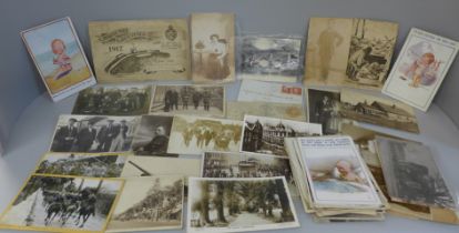 A collection of approximately 60 postcards and letters including photographic WWI military and other