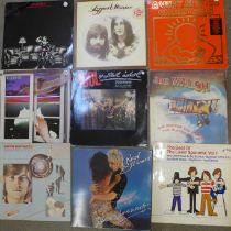 A collection of 1960s and 1970s LP records including Beach Boys, ELO, Elton John, Billy Idol,