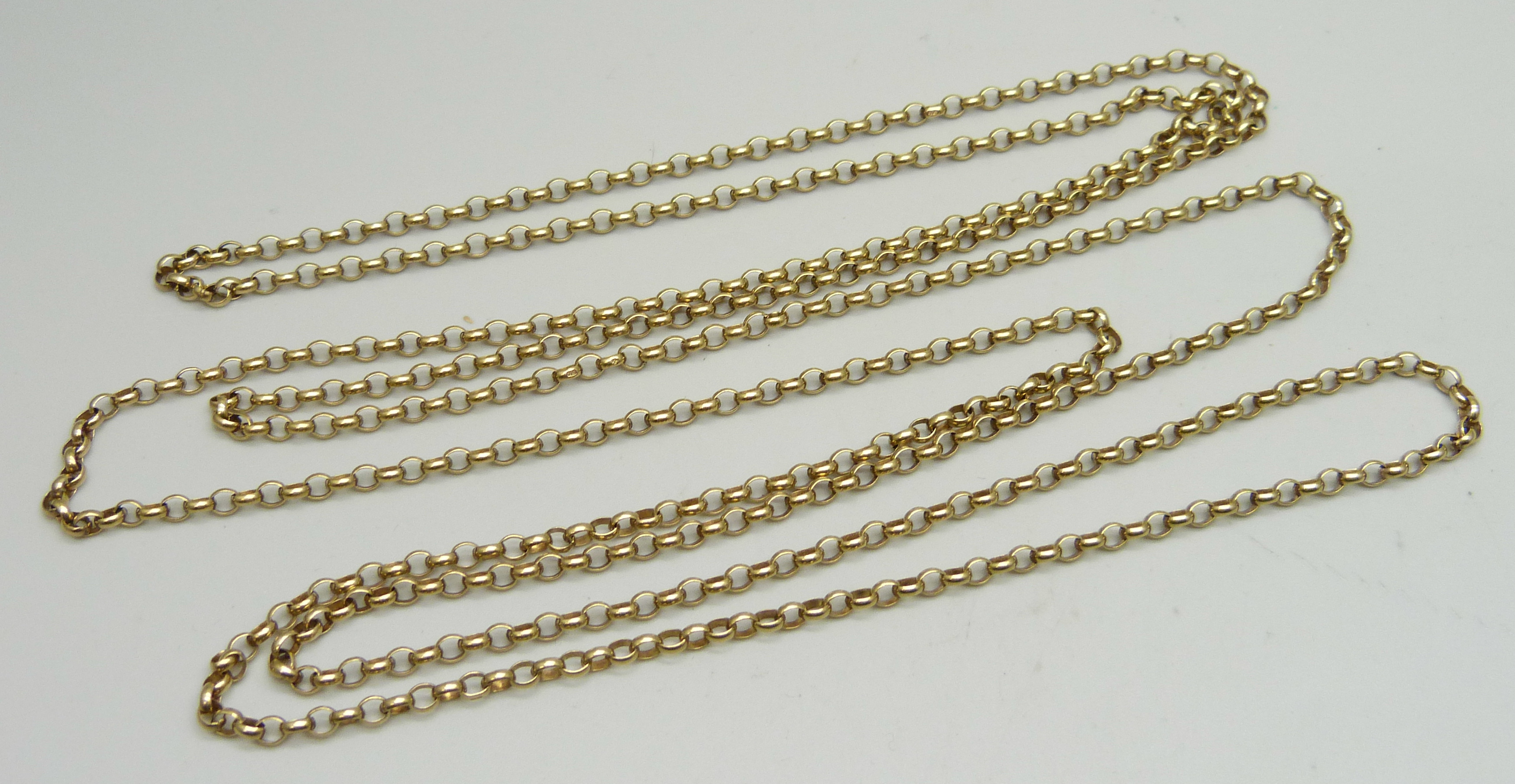 An unmarked yellow metal oval belcher link long guard chain (tests as 9ct gold), 158cm, 26.1g