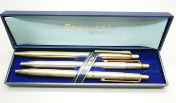 Three signum ballpoint pens; two 925 silver and one rolled-gold, with one Signum box