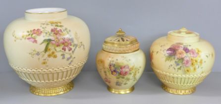 Three Royal Worcester blush ivory pots, each decorated with a bouquet of flowers, smallest with