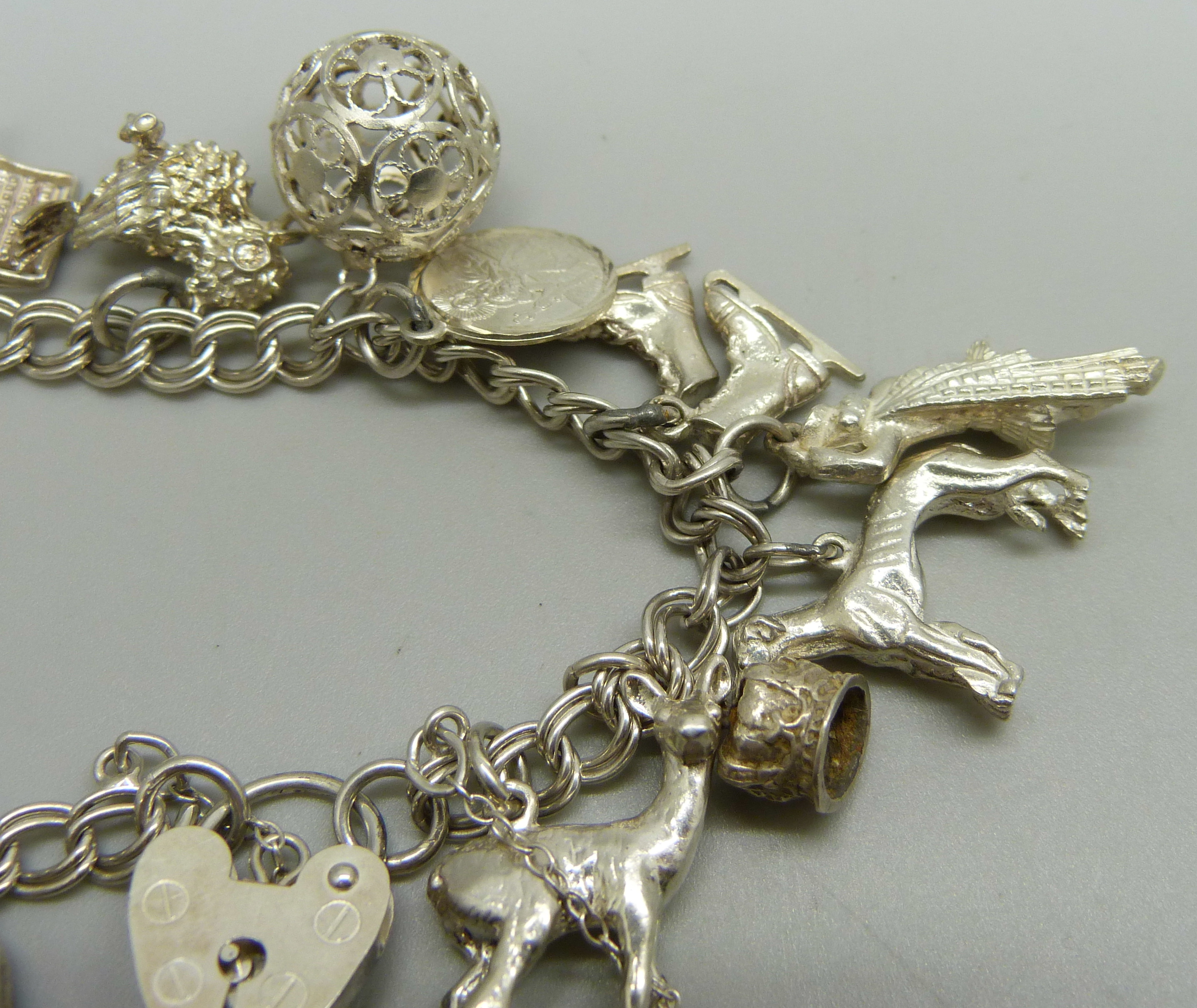 A silver charm bracelet, 40g - Image 2 of 3