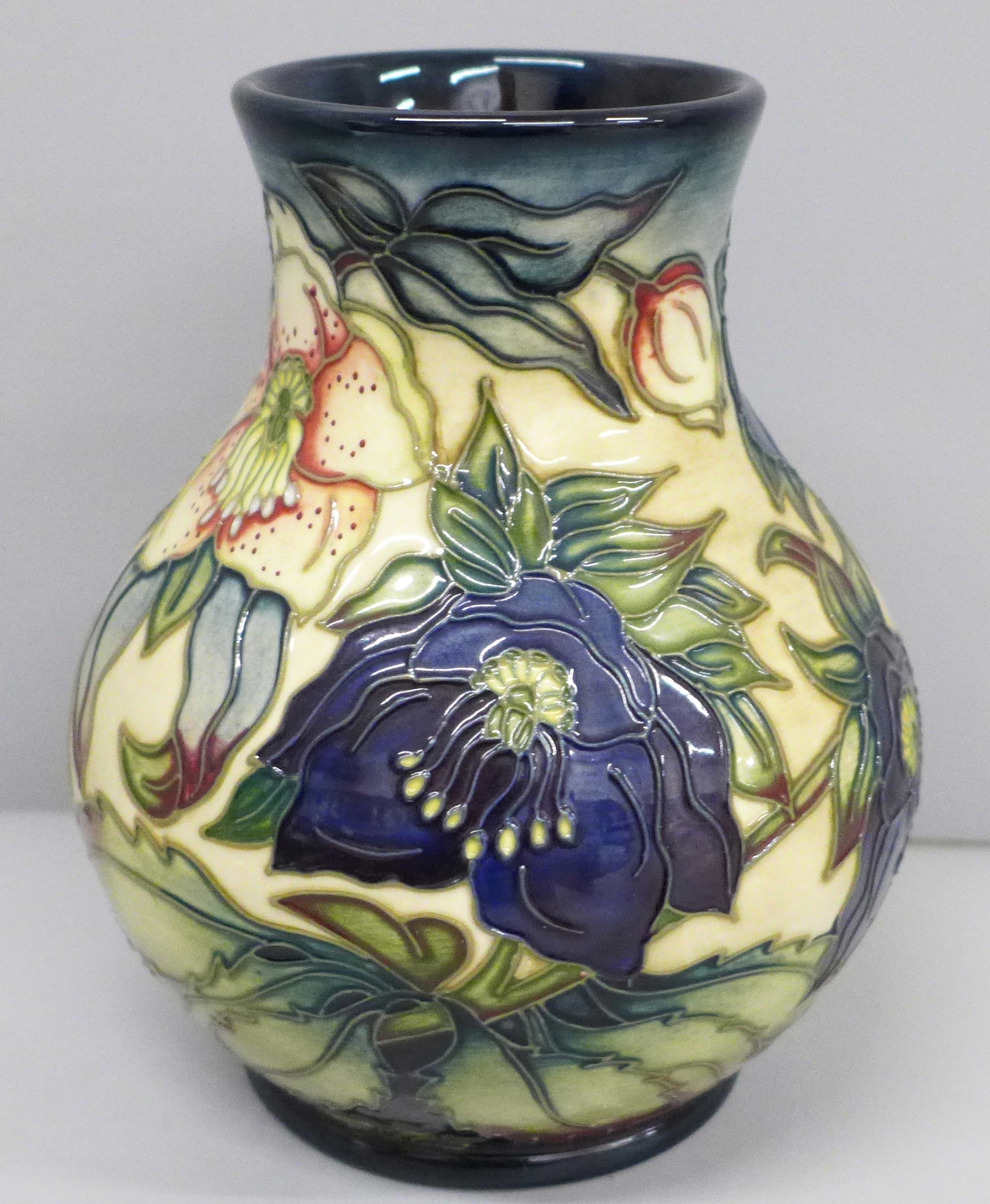 A Moorcroft Hellebore vase, 869/6, in original box, 16cm