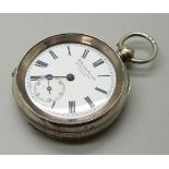 A silver pocket watch, Kendal and Dent, London (glass loose, missing minute hand)