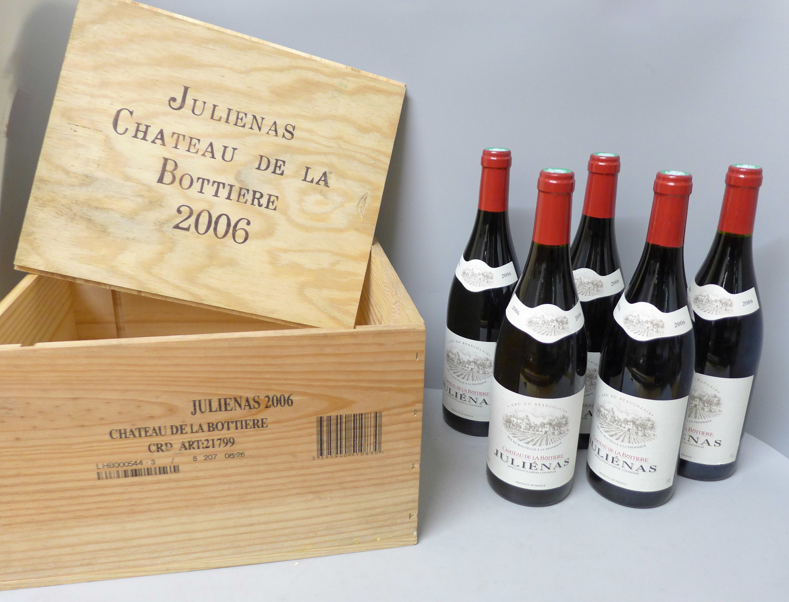 Five bottles of 2006 Julienas Beaujolais in a wooden box **PLEASE NOTE THIS LOT IS NOT ELIGIBLE