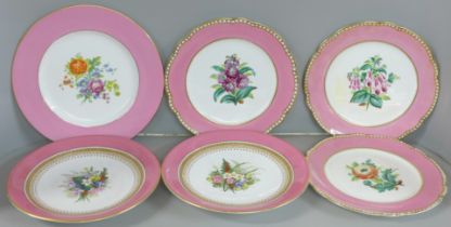 A set of three cabinet plates with pink border and floral decoration to the centre, three others