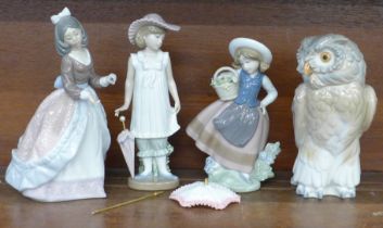 Two Lladro figures and two Nao figures including a model of an owl, parasol a/f