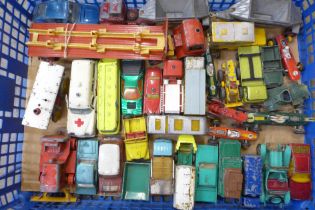 A collection of over 30 Lesney Matchbox, Corgi and Dinky model vehicles from the 1950s-60s