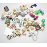 A collection of vintage and modern clip-on earrings