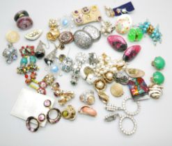 A collection of vintage and modern clip-on earrings