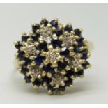 An 18ct gold, sapphire and diamond cluster ring, 6g, S/T