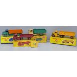 Four Dinky Toys, 409 Bedford lorry, 418 Comet wagon, 421 Electric articulated lorry and 431 Guy