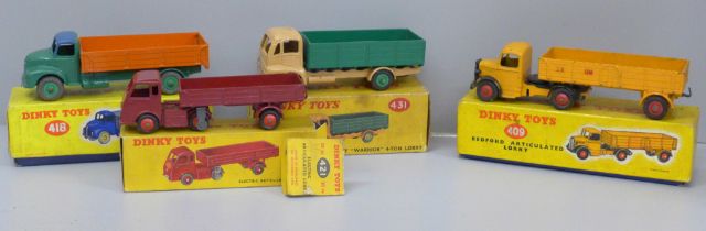 Four Dinky Toys, 409 Bedford lorry, 418 Comet wagon, 421 Electric articulated lorry and 431 Guy