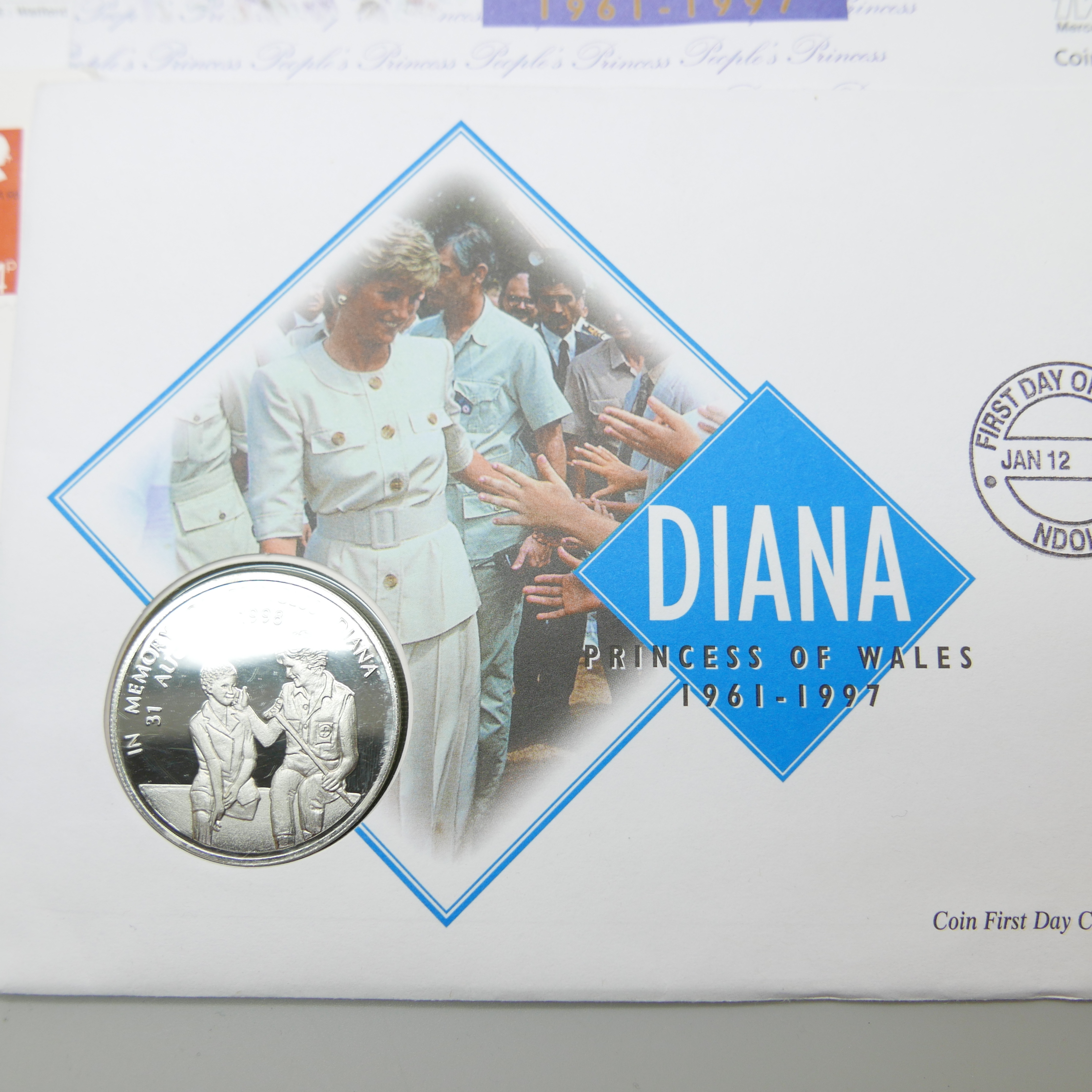 A collection of coin sets, mostly Princess Diana and other Royalty first day covers including a £5 - Image 3 of 3