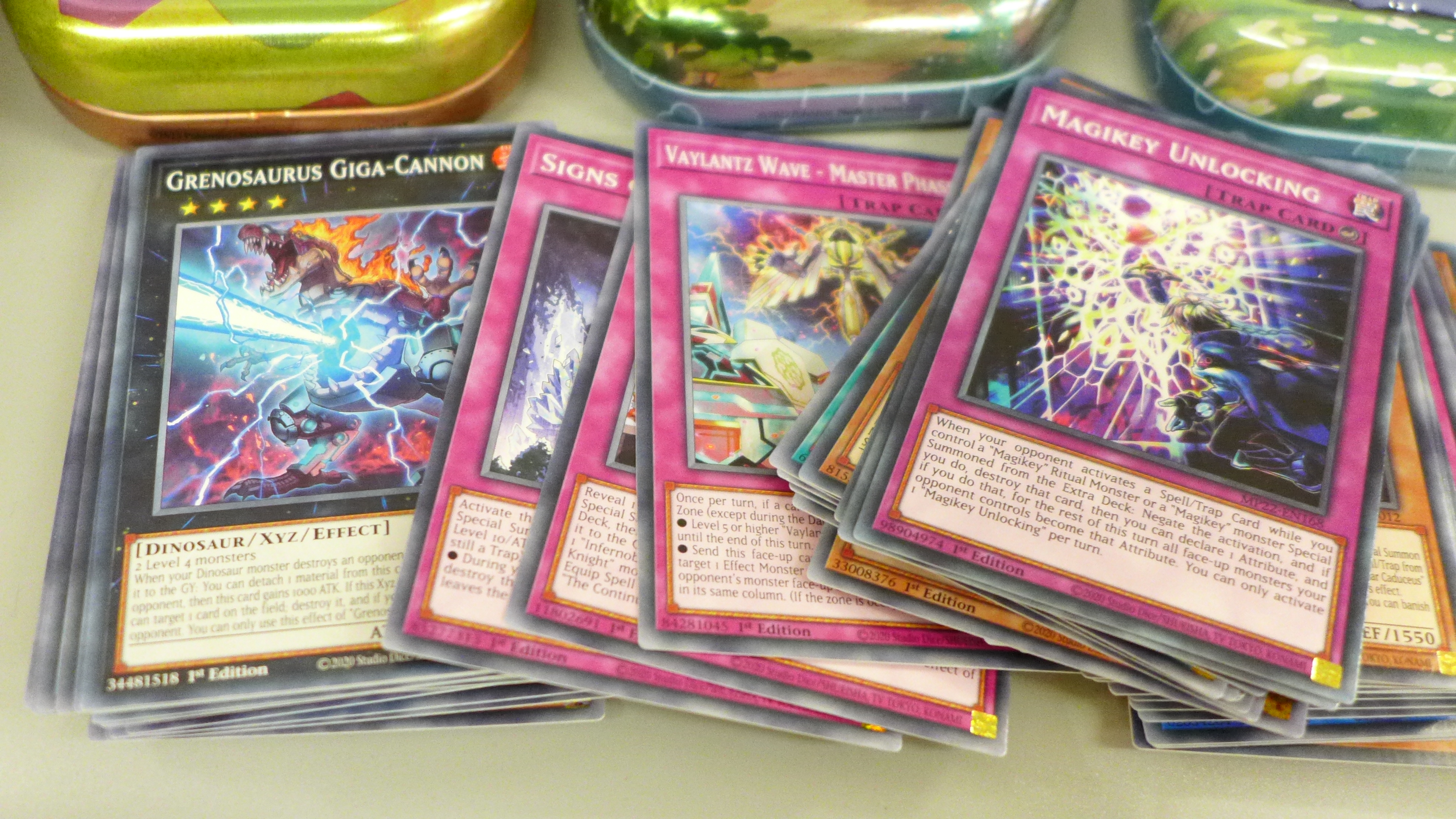 Eight Pokemon tins, Yu-gi-Oh! gaming cards and a mix of gaming cards - Image 2 of 4