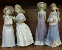 Four Lladro figures of young girls, three with bonnets and one holding a box of flowers