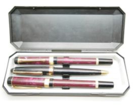 A cased set of three German pens