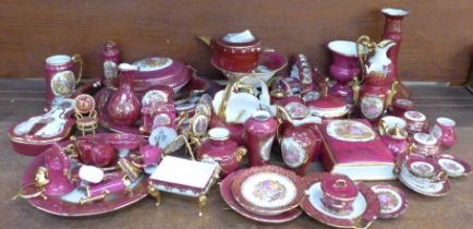 A collection of Limoges porcelain, approximately 60 pieces