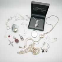 Silver and white metal jewellery including Swarovski, a silver locket, an Art Nouveau style silver