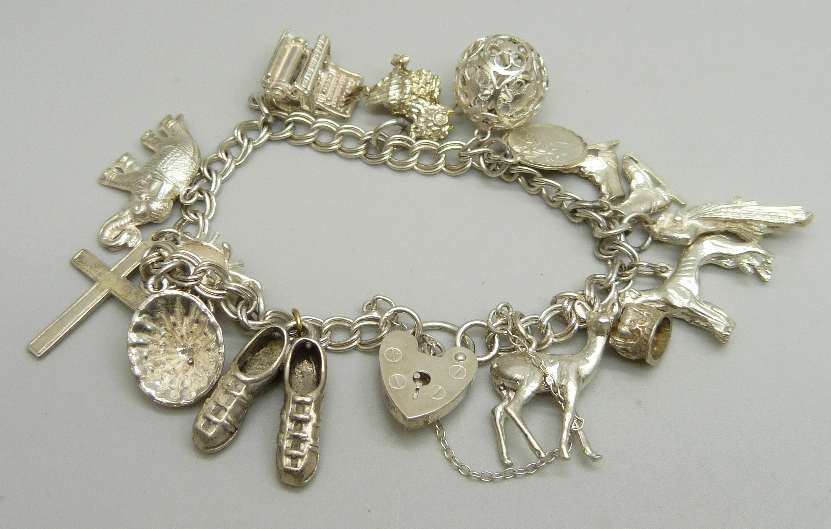 A silver charm bracelet, 40g