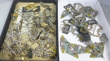 A collection of Victorian and later buckles and brooches, some paste set, some stones missing