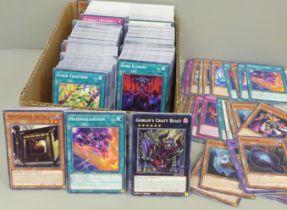 A large quantity of Yu-Gi-Oh cards, over 1000 including first editions