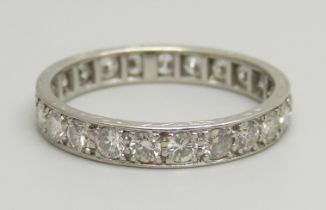 A white metal eternity ring set with approximately 2ct of diamonds, 3.2g, P
