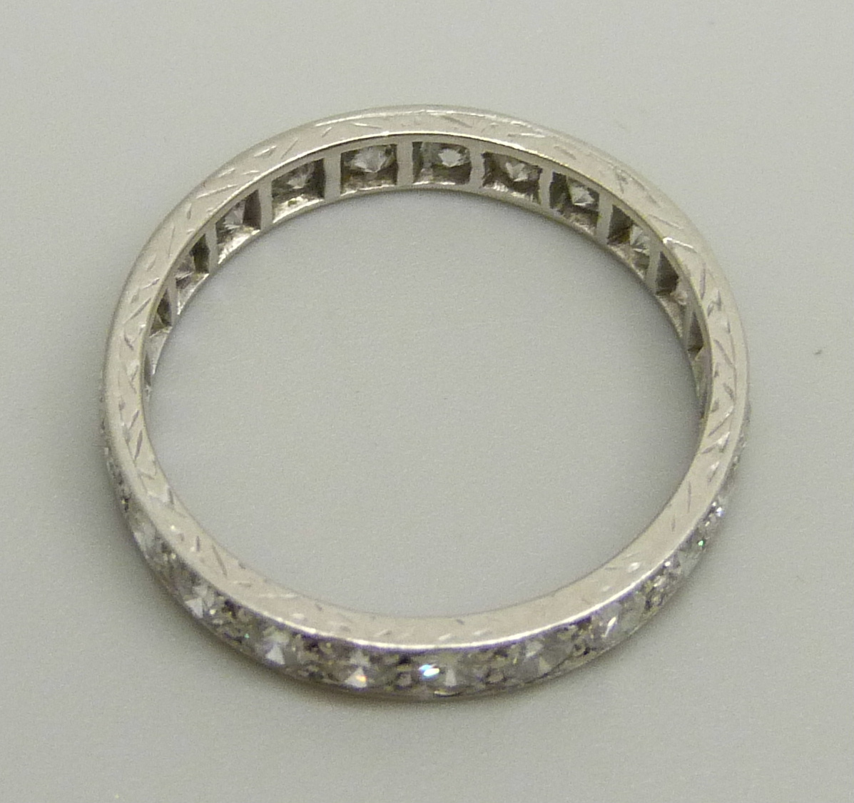 A white metal eternity ring set with approximately 2ct of diamonds, 3.2g, P - Image 4 of 4
