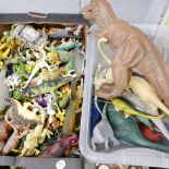 Two boxes of plastic toy dinosaurs **PLEASE NOTE THIS LOT IS NOT ELIGIBLE FOR IN-HOUSE POSTING AND