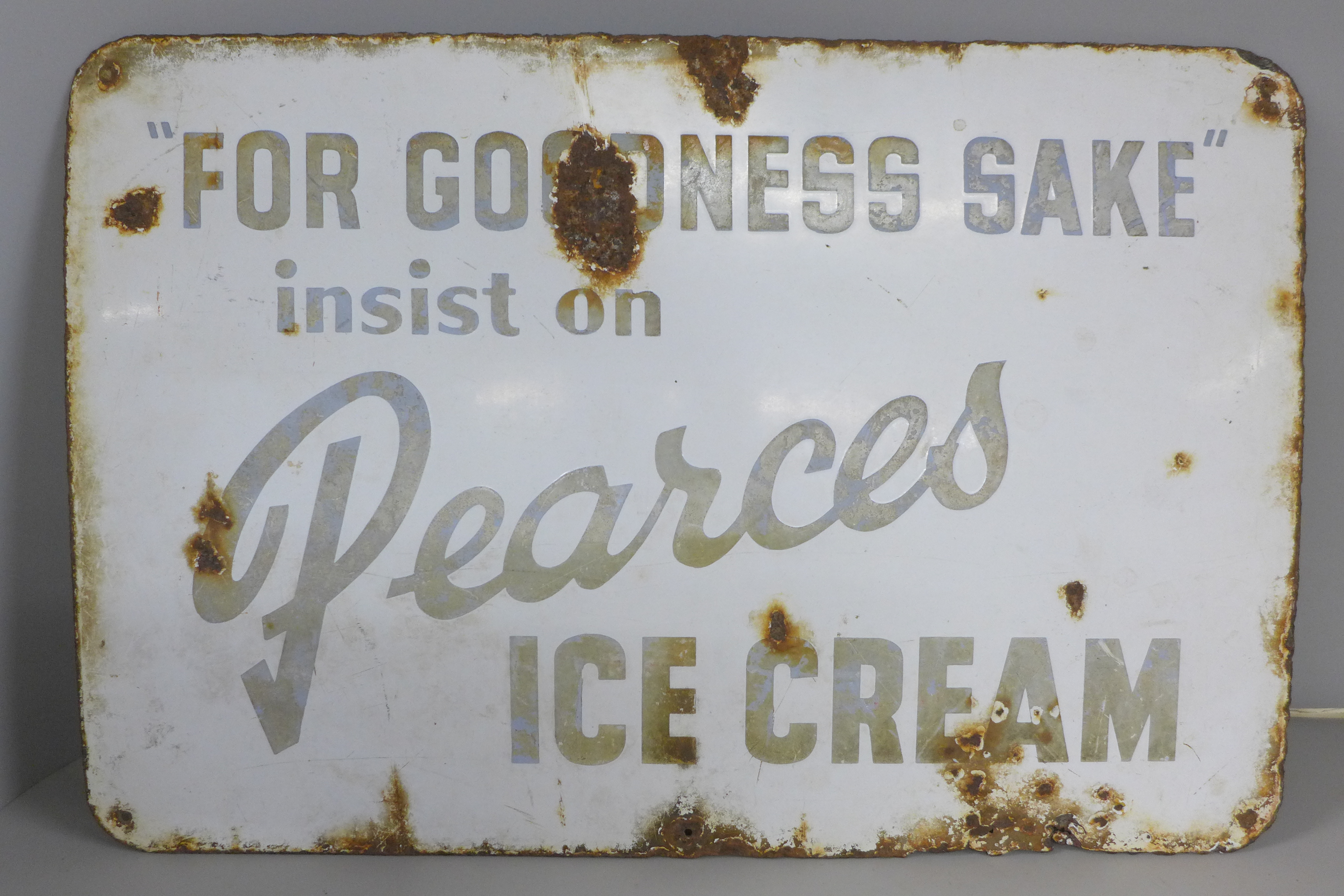 A Pearces Ice Cream enamel sign from a former Nottingham factory, 18" x 12"