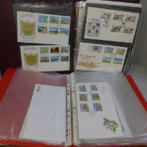 Two albums of first day cover stamps, mainly Alderney