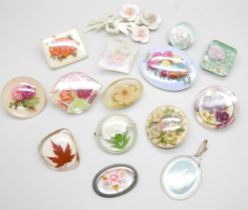 Fifteen vintage Perspex brooches
