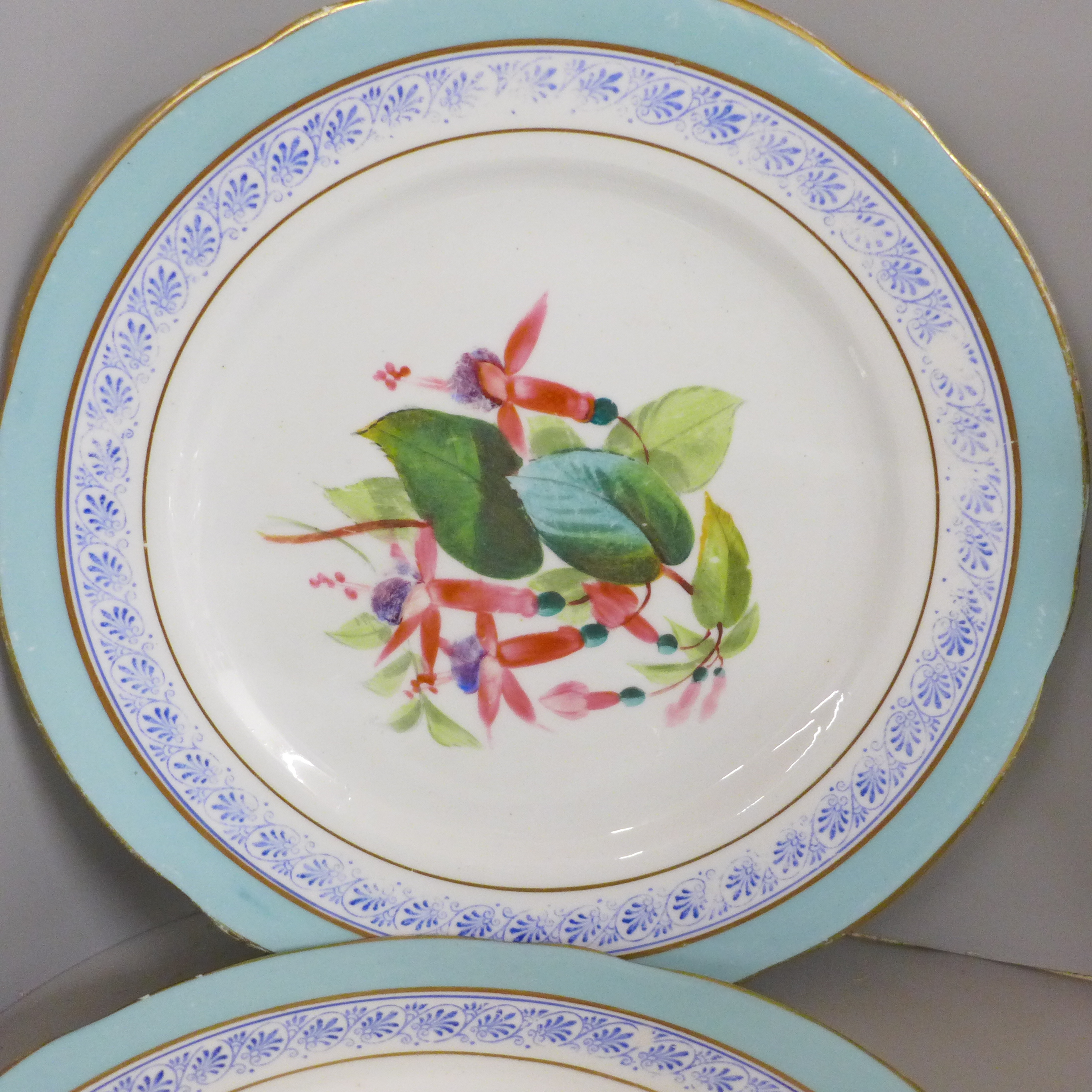 A set of four cabinet plates with duck egg blue border and hand painted floral decoration and two - Image 2 of 4