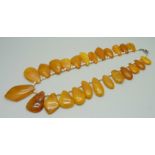 An amber and seed pearl necklace, 51.2g