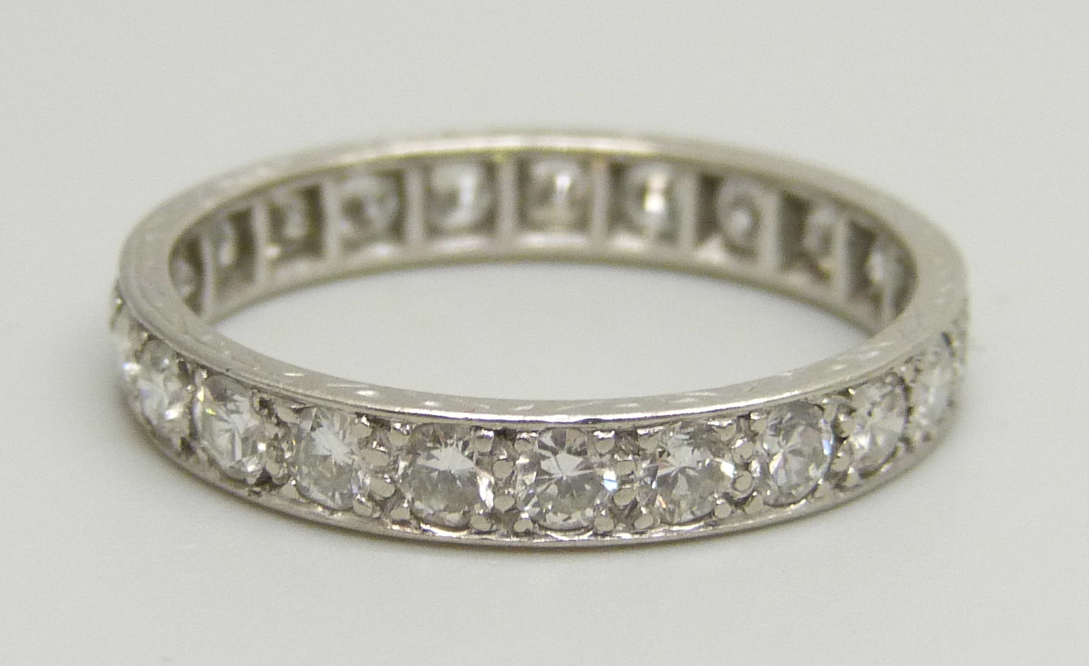A white metal eternity ring set with approximately 2ct of diamonds, 3.2g, P - Image 2 of 4