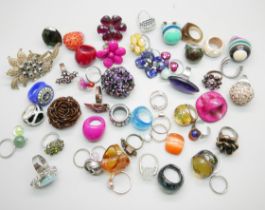 A collection of vintage and later costume rings, two multicolour resin rings, Murano, etc.