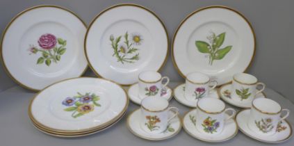 A set of six Royal Worcester hand painted coffee cans, saucers and plates, decorated with flowers,