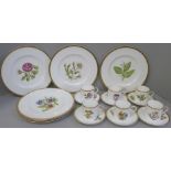 A set of six Royal Worcester hand painted coffee cans, saucers and plates, decorated with flowers,