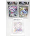 Three Getgraded Pokemon cards, Smeargle and Tyranitar, 9.5 mint and Fidough, 9 mint